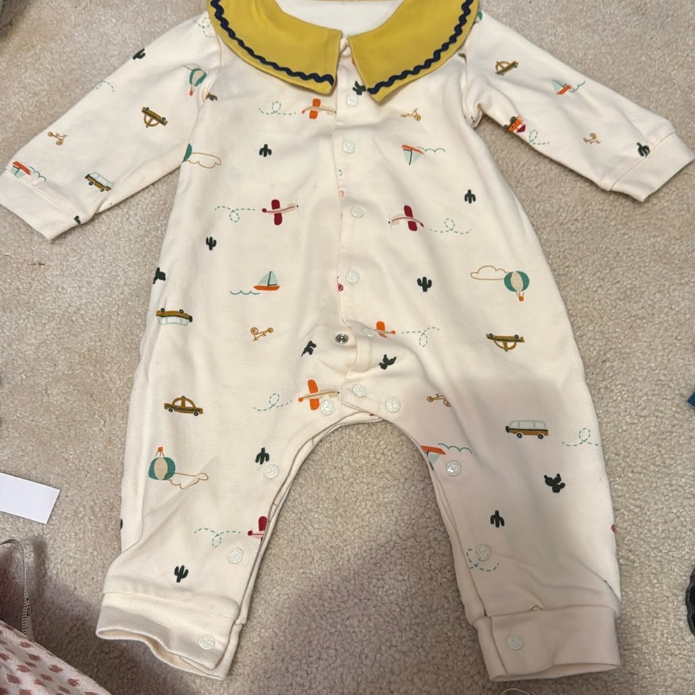 Pure born one piece outfit. Like new. Size 6 months.